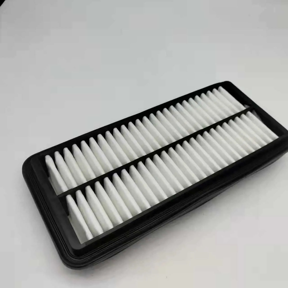 Black car air filter for Modern vehicles measuring 256x113x40mm