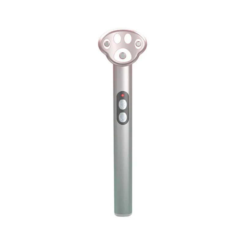 Pink gradient cat's paw shaped eye massager with micro-current vibration and colour light therapy.