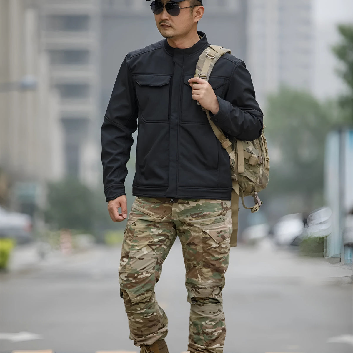 Bone Frog Peak Breaker soft shell jacket in black camouflage for outdoor mountaineering and tactical use.
