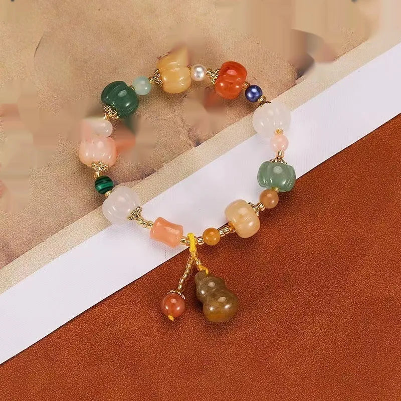 Hand-carved pumpkin lotus beads bracelet in white jade and bodhi root with multiple bead sizes