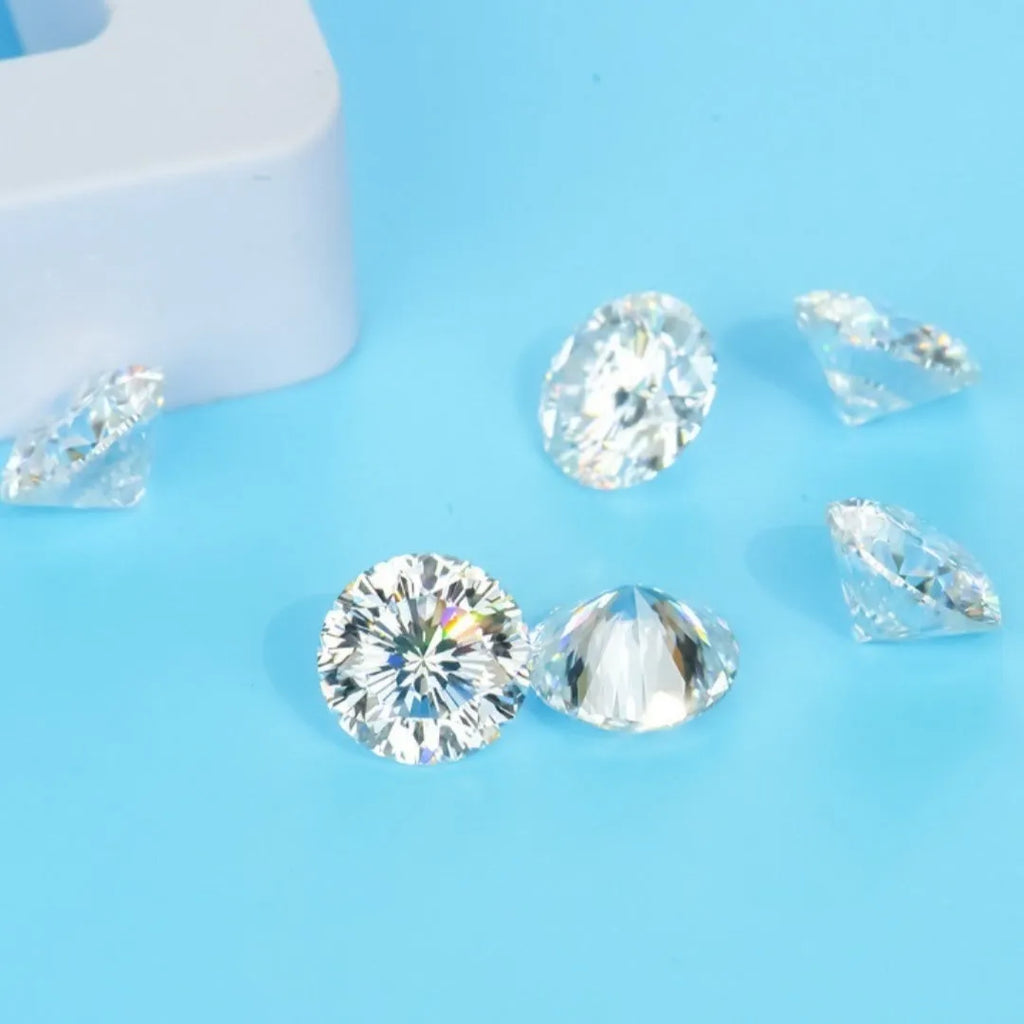 A round, brilliant moissanite gemstone showcasing the eight hearts and eight arrows cut on a neutral background.