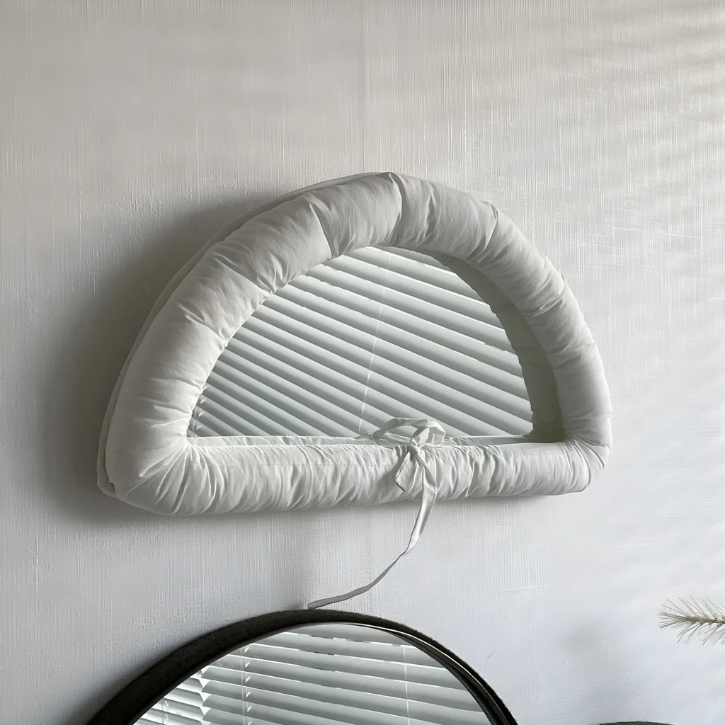 Hanging soft cotton fabric mirror in sapphire blue colour with rectangular shape and padded appearance