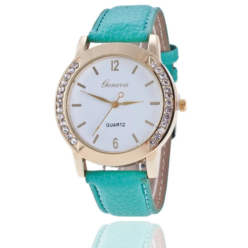 Geneva women's quartz watch with blue dial, round alloy case, and imitation leather strap on display