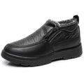 Men's black fleece-lined winter slip-on shoe with a non-slip rubber sole, shown on a size 45 foot.