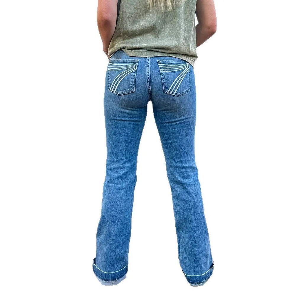 Slim fit elastic mid-waist jeans with slight flare and embroidery detailing in blue colour