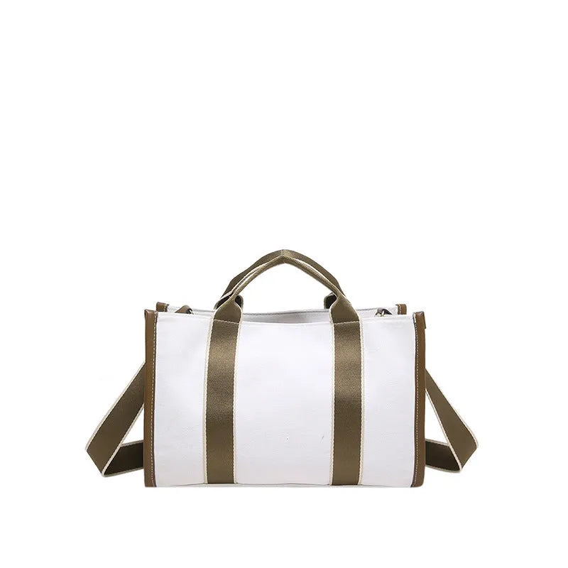 Women's canvas tote bag in horizontal square shape with open pocket, available in black