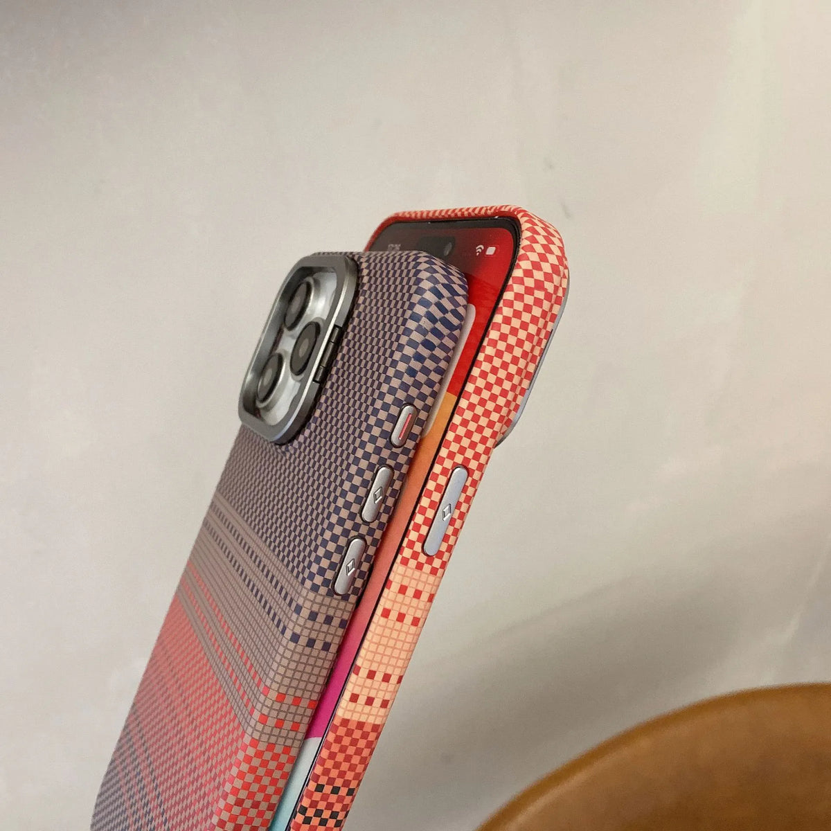 Magnetic phone case with metal lens holder and bracket for iPhone 14 Pro in Sunset Orange colour