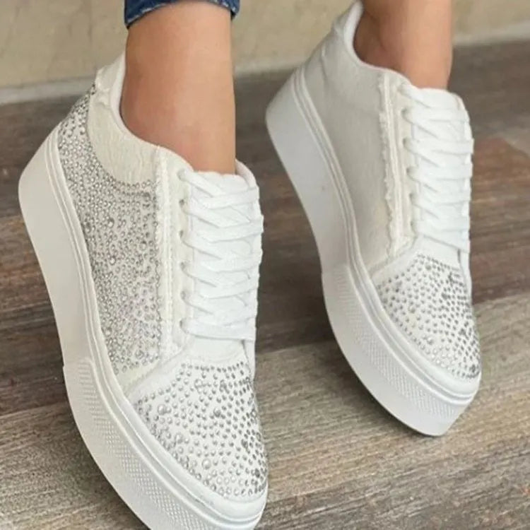 Plus size women's low-top lace-up casual shoes with rhinestone detail and a thick rubber sole, in black.