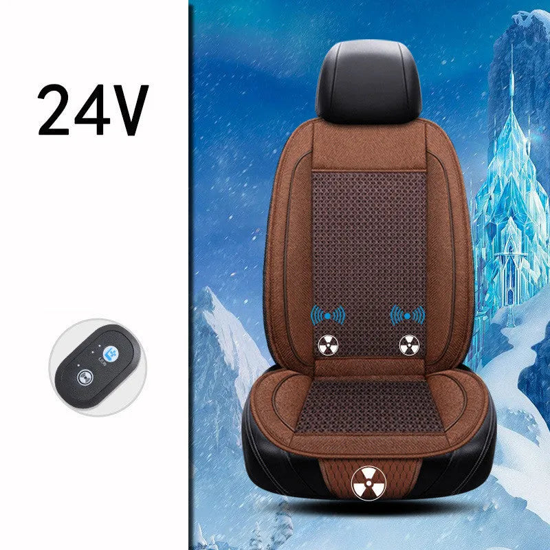 Square black car seat cushion with ventilation and massage functions on a car seat.