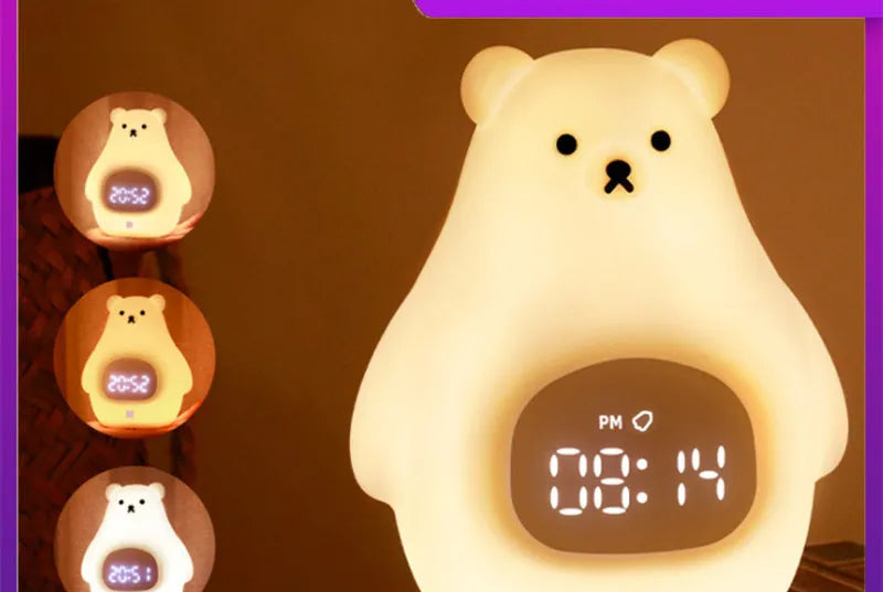 White silicone cartoon bear night light with remote control on a surface.
