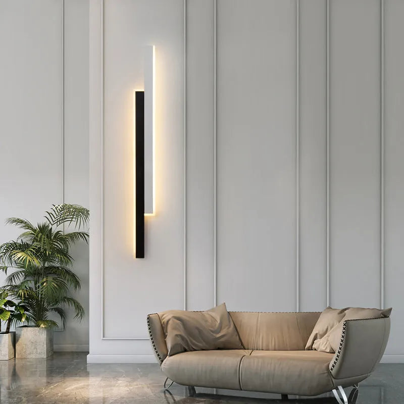 Modern black and white strip wall lamp with acrylic shade and three-colour LED lighting