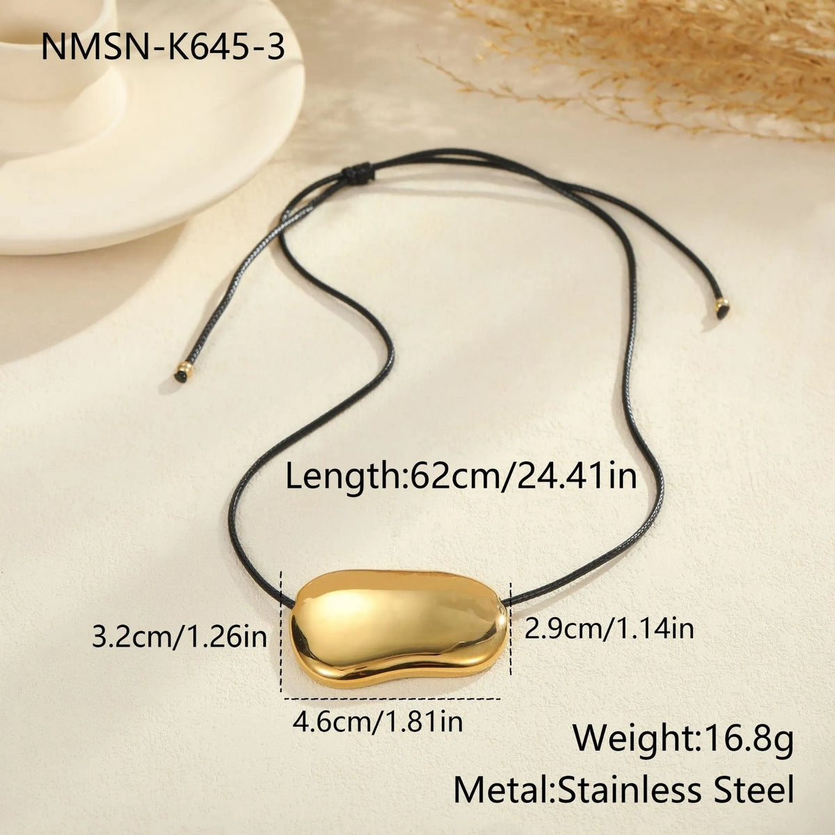 Black rope titanium steel necklace with geometric pendant in gold or silver finish on model