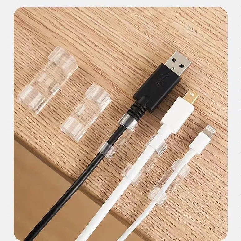 Transparent self-adhesive cable clips in four sizes for punch-free wire organisation