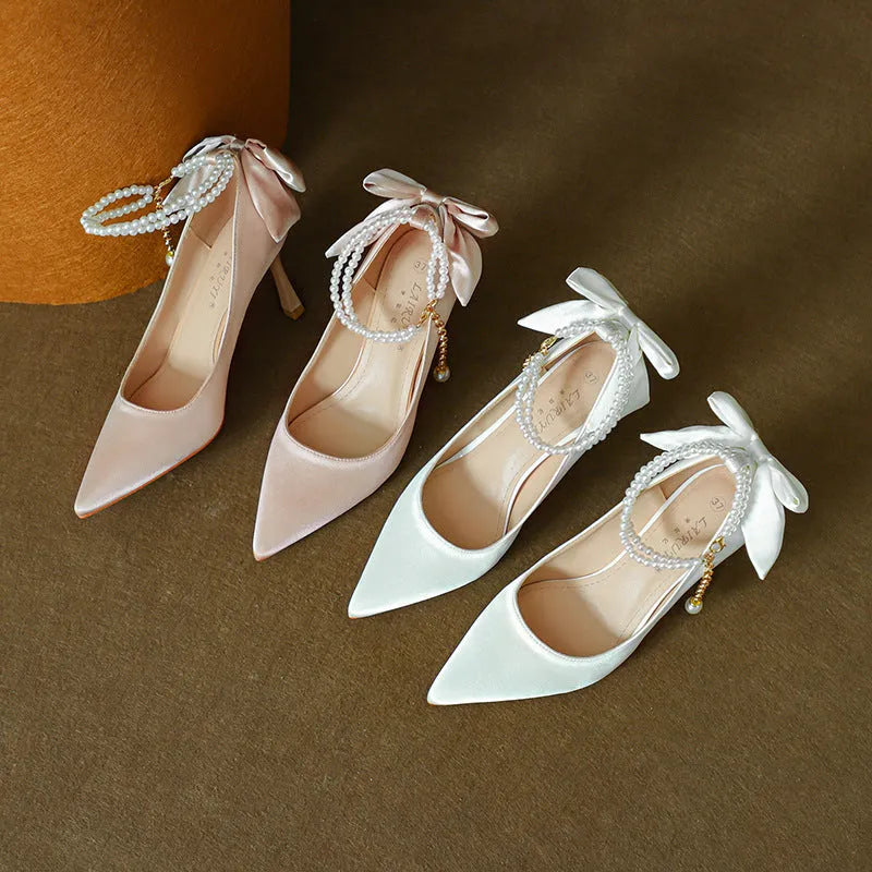 Stiletto pointed toe satin pumps with beaded pearl strap in Champagne colour