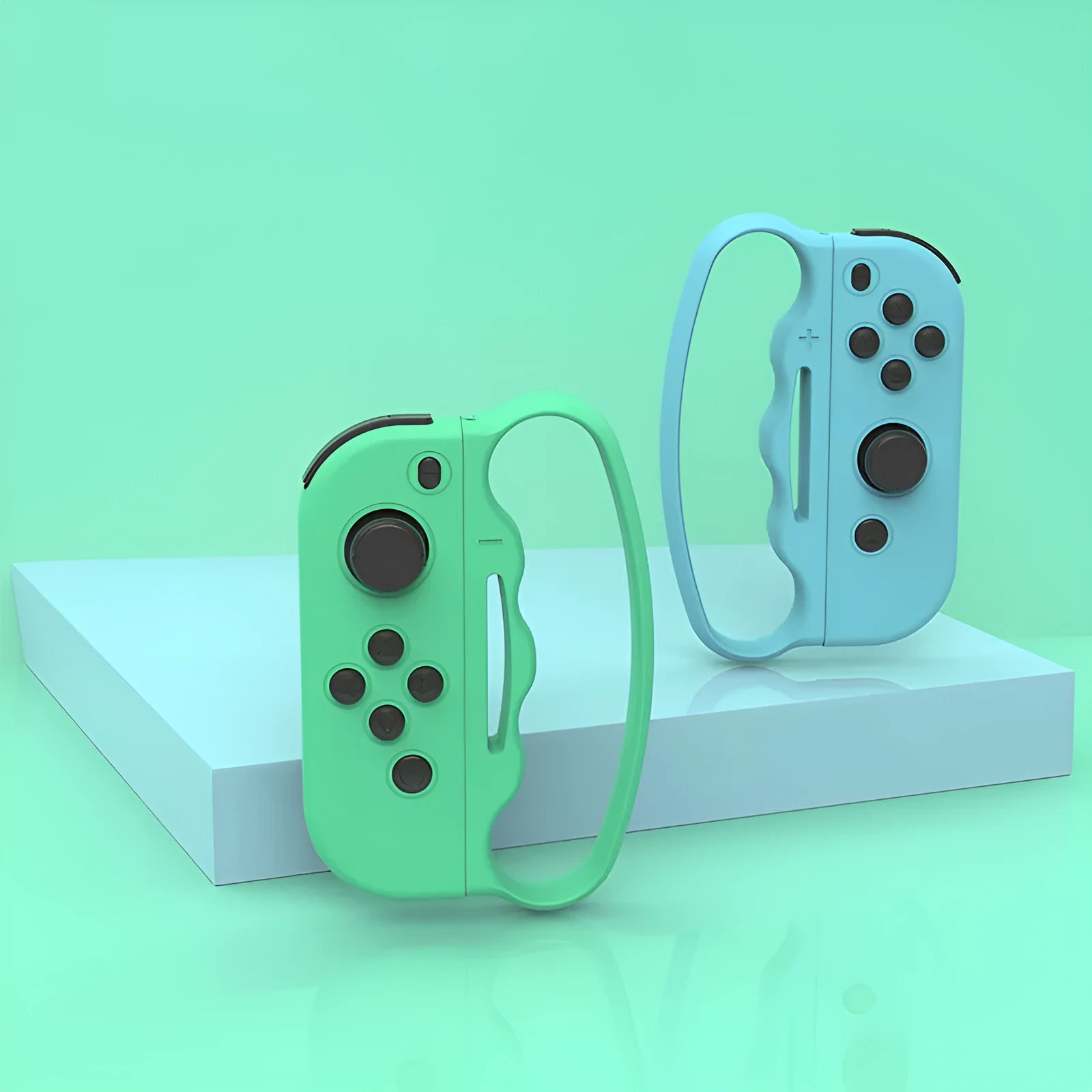 Two black Joy-Con controller grip sets with hand ropes shown beside Nintendo Switch console