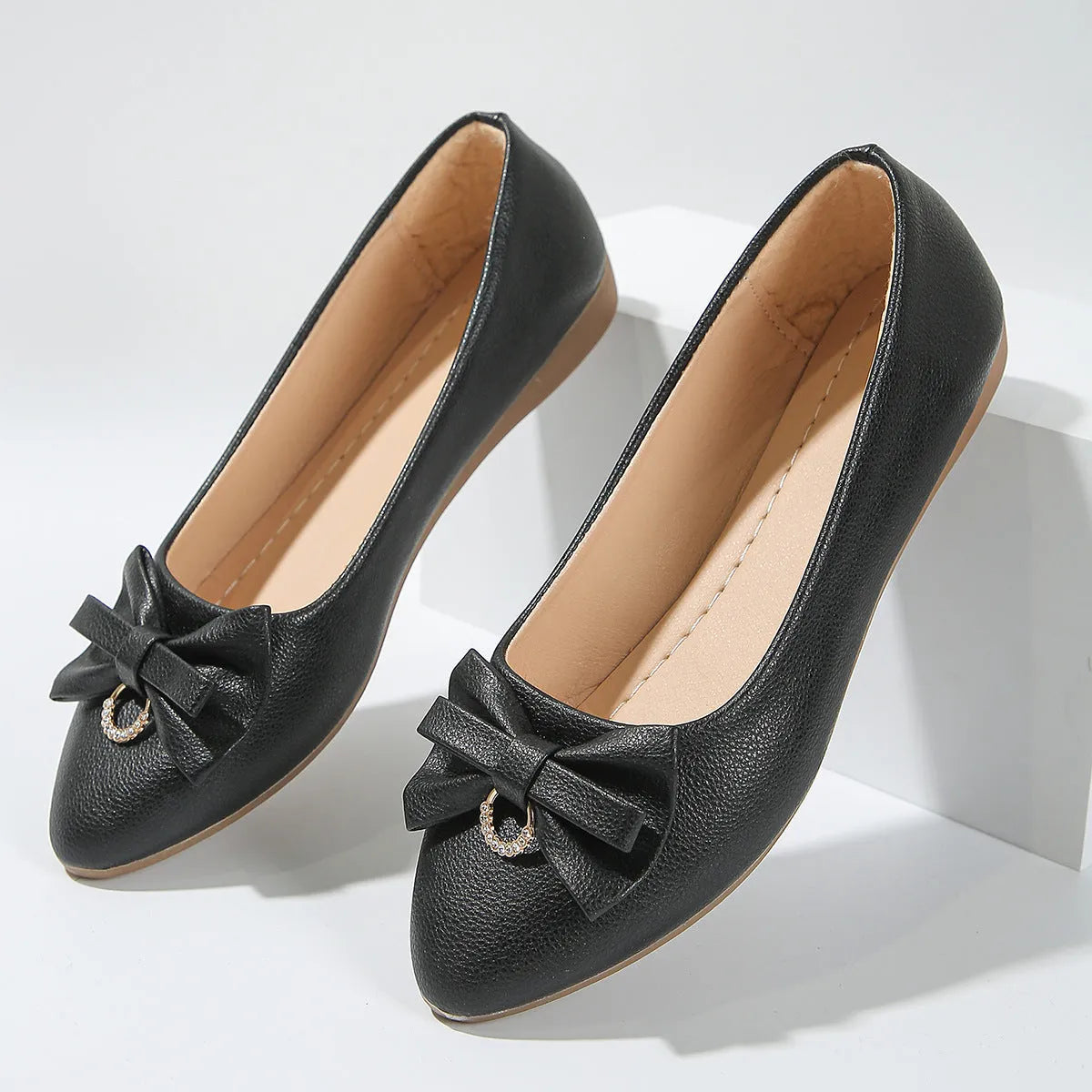 Women's flat casual bowknot shoes in beige with shallow mouth design and round toe