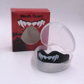 Adult boxing sports mouthguard with tooth socket free design in black and white printed teeth pattern.