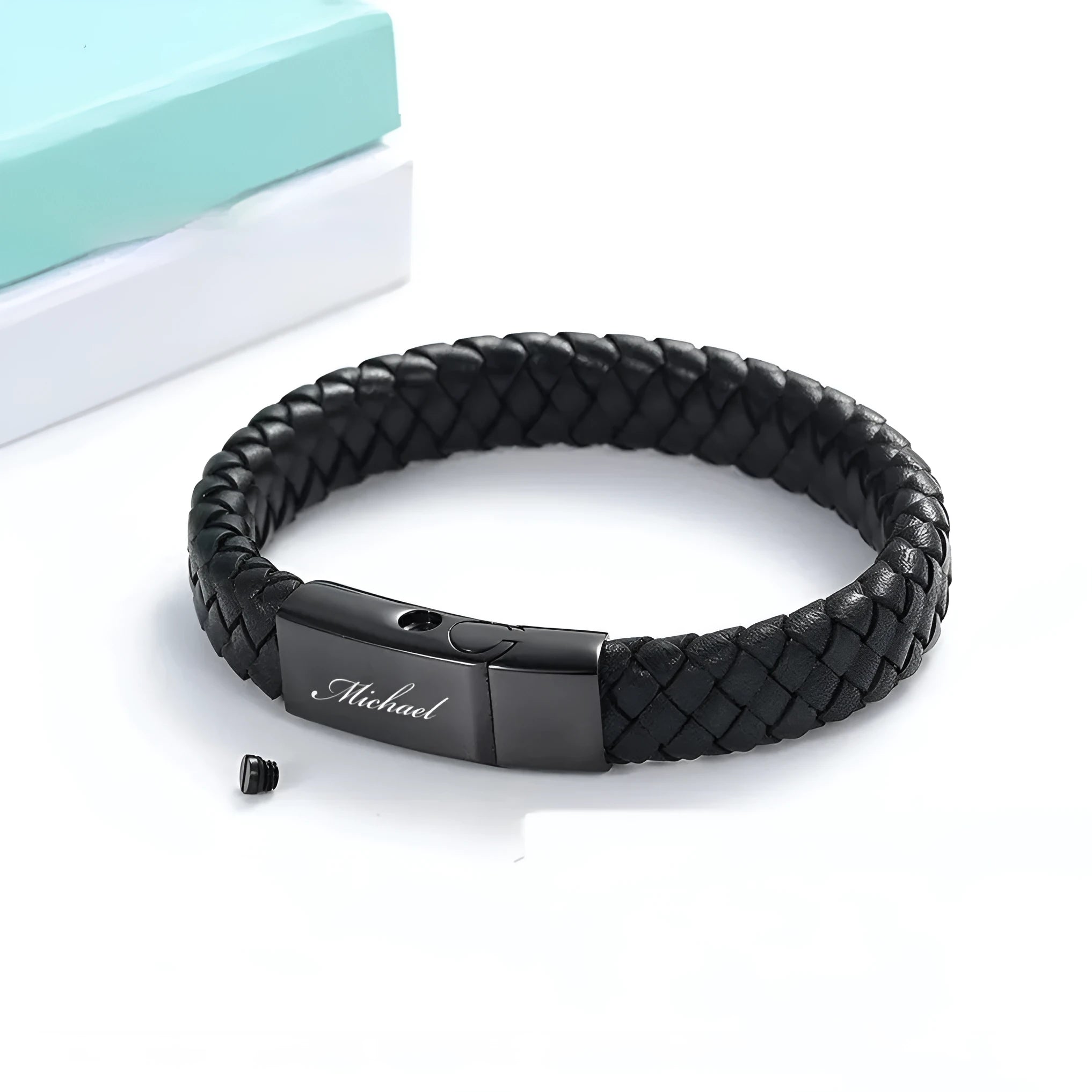 Black stainless steel and leather memorial bracelet with personalised lettering in a gift box.