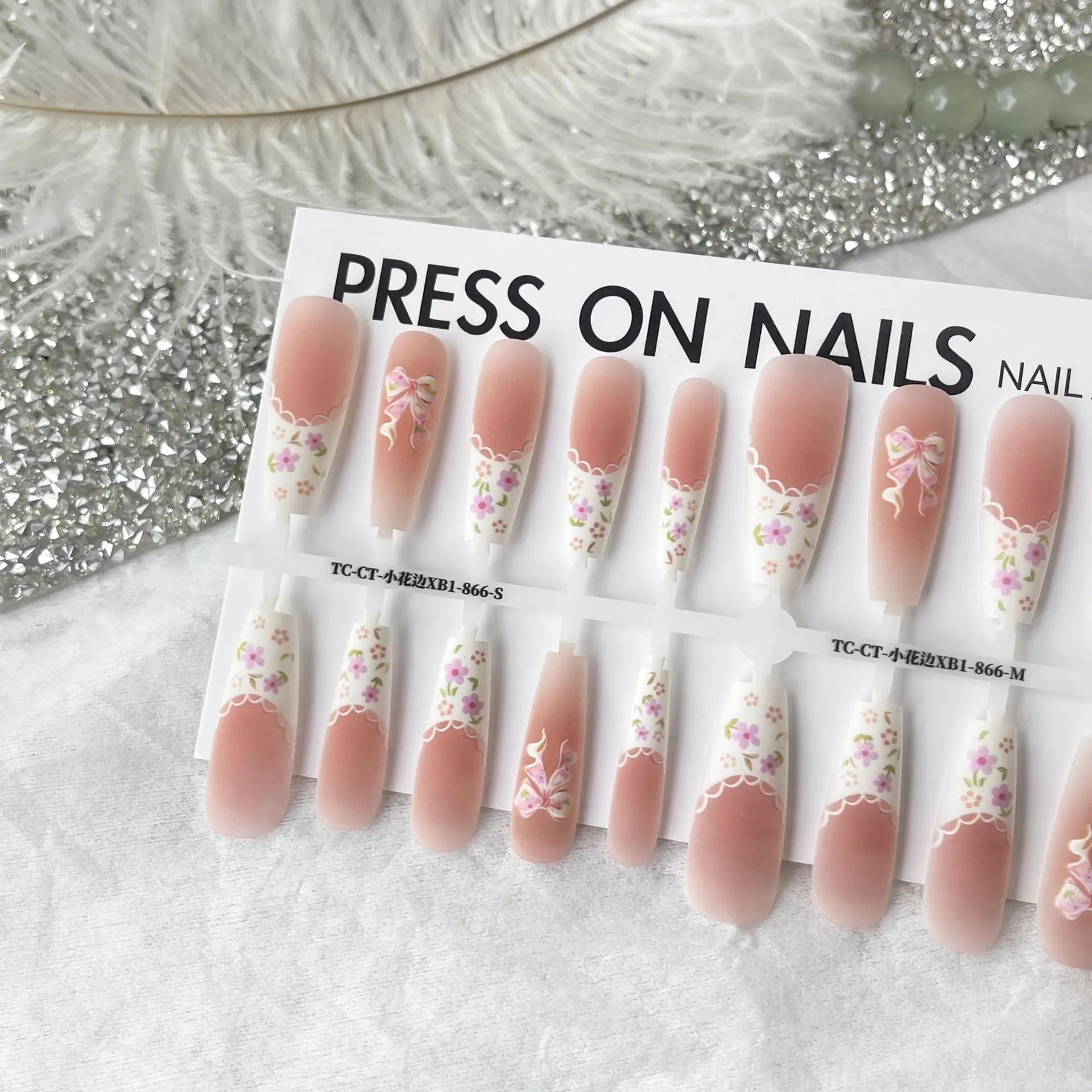 Small floral prefabricated nail tips with long ladder velvet seal layer in white small lace pattern XB1-866