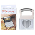 Stainless steel potato wave knife with crinkle-cut blade on a kitchen worktop