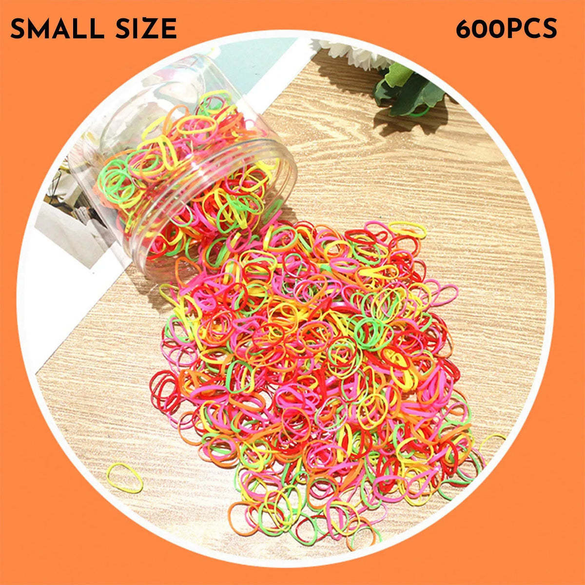 Multi-colour TPU baby hair elastic bands spilling from a reusable container.