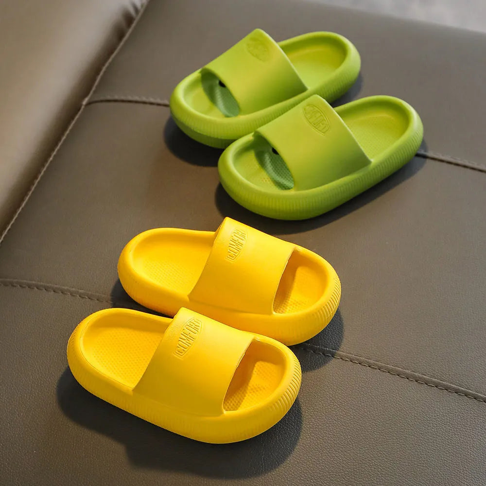 Colourful children's EVA slippers with a non-slip sole, shown in mixed colours on a white background.