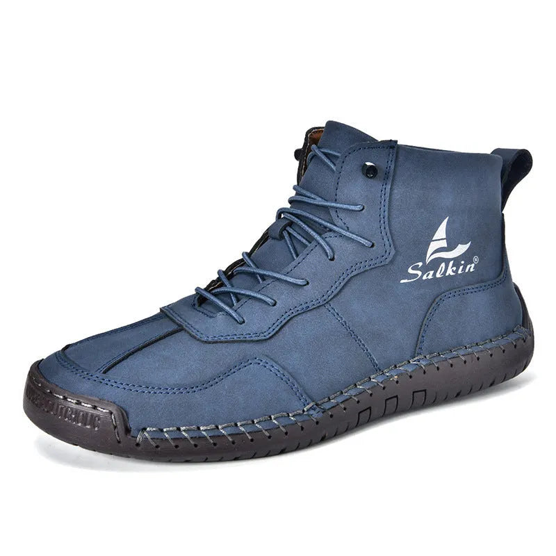 Men's beige retro-style mid-calf boots with an elastic band and flat rubber sole on a white background.