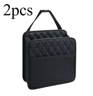 Black leather hanging chair-shaped storage bag for car interior use.