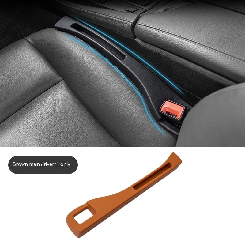 Black plastic car seat gap storage organiser box with a handle.