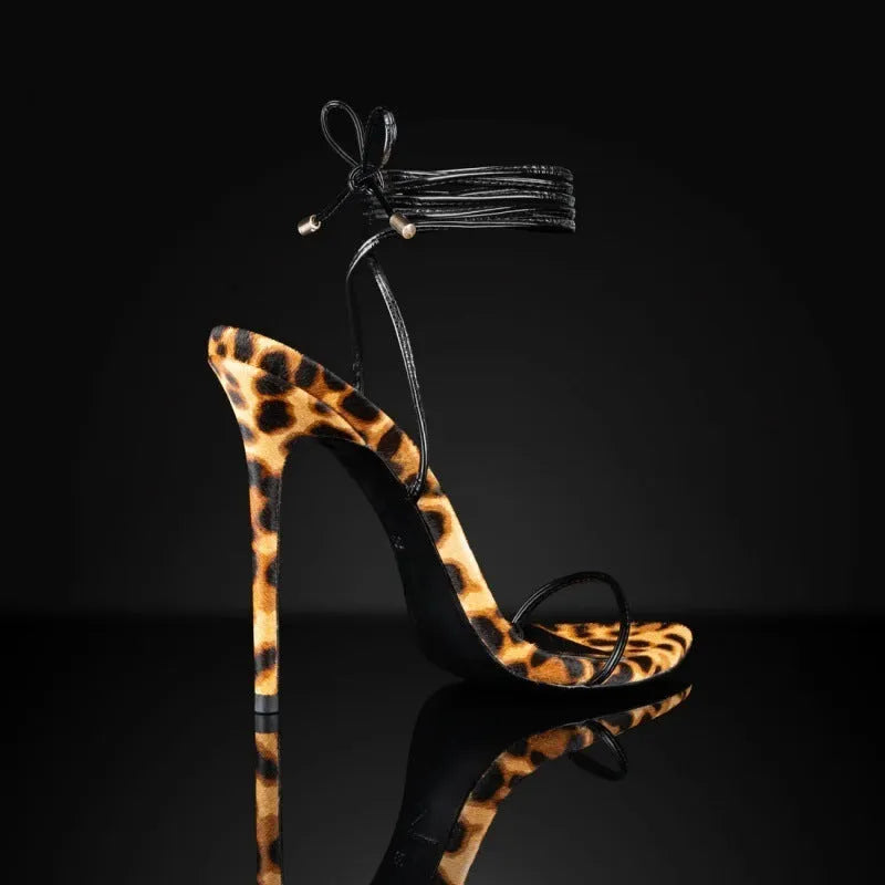Women's leopard print Roman sandals with lace-up buckle closure and pointed toe