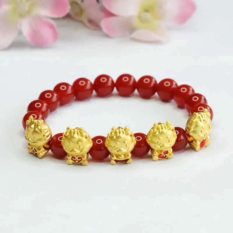 Red agate Five Blessing Dragon bracelet with 8mm beads on a wrist.