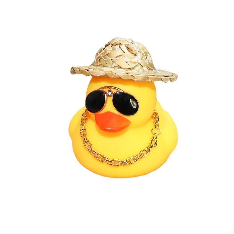 Yellow cartoon duck car ornament with straw hat and metal sunglasses for dashboard decoration