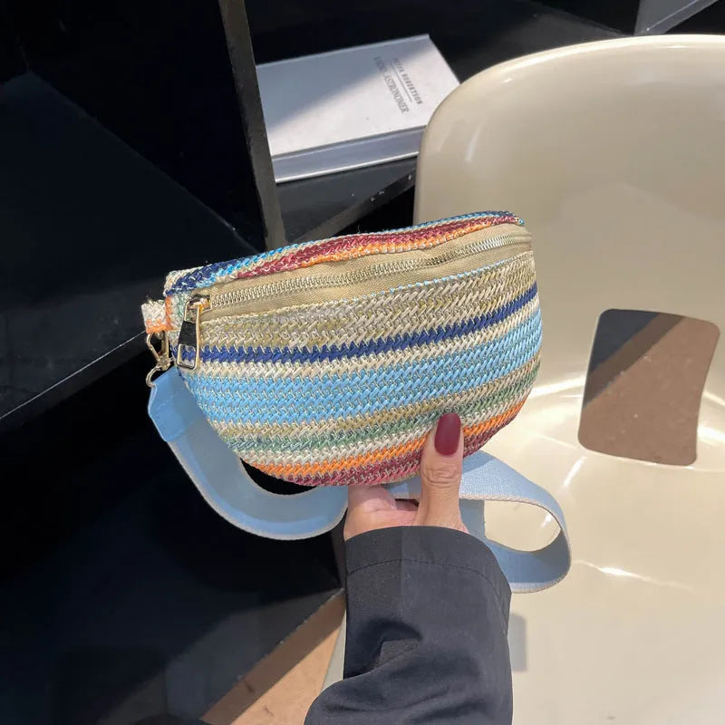 Bohemian woven straw beach bag with single strap in pink or blue showing sandwich pocket and shell shape