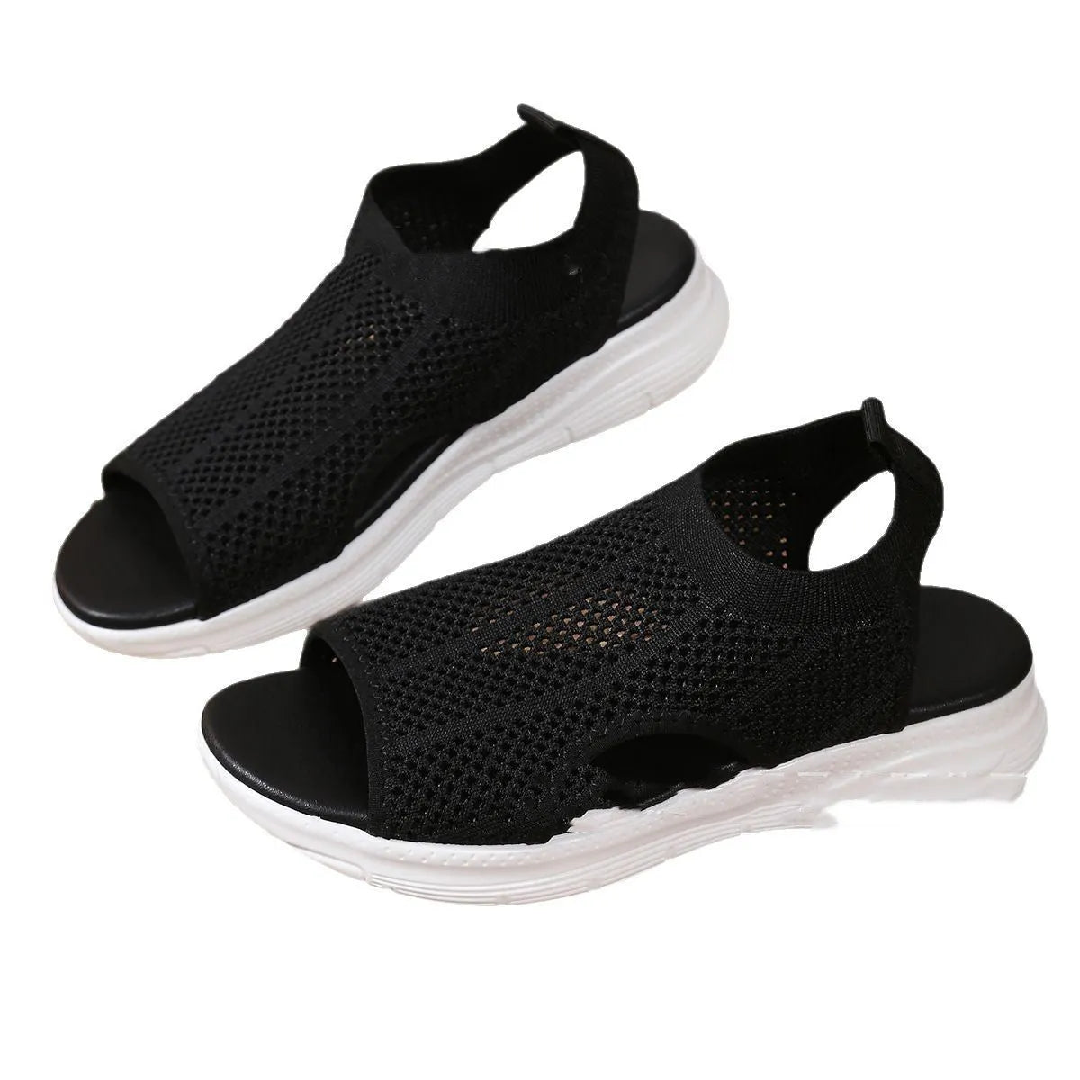 Women's flat platform sports sandals in black with a rubber sole and mesh lining.