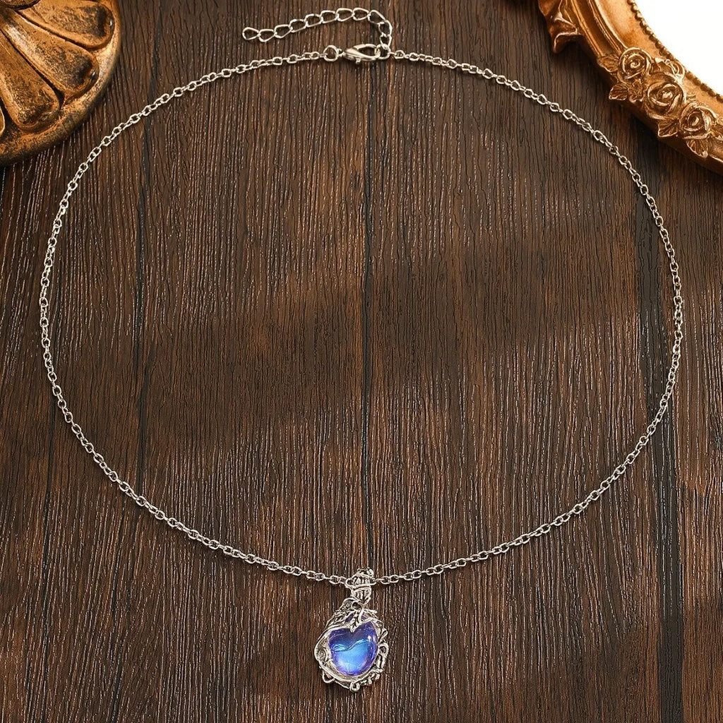 Moonstone necklace with oval cabochon pendant and silver-tone chain for weddings and everyday wear