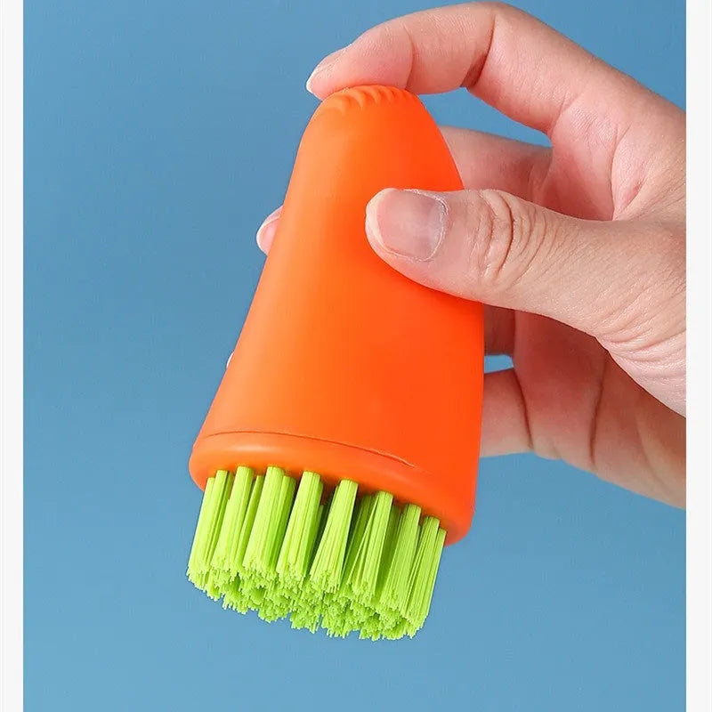 Carrot-shaped nylon cleaning brush in orange colour with radish pattern design
