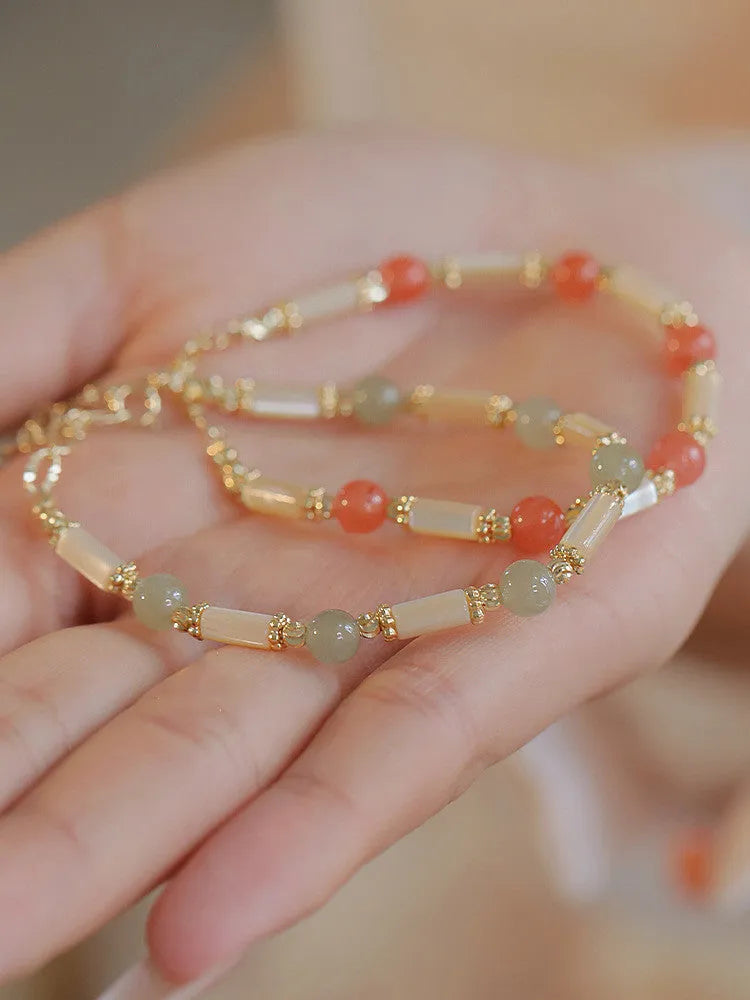 Hetian jade bamboo joint bracelet 6mm bead size on display against neutral background