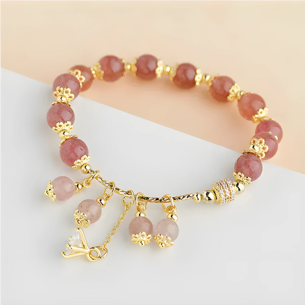 Pink strawberry quartz crystal bracelet with heart shapes and pearl accents for women