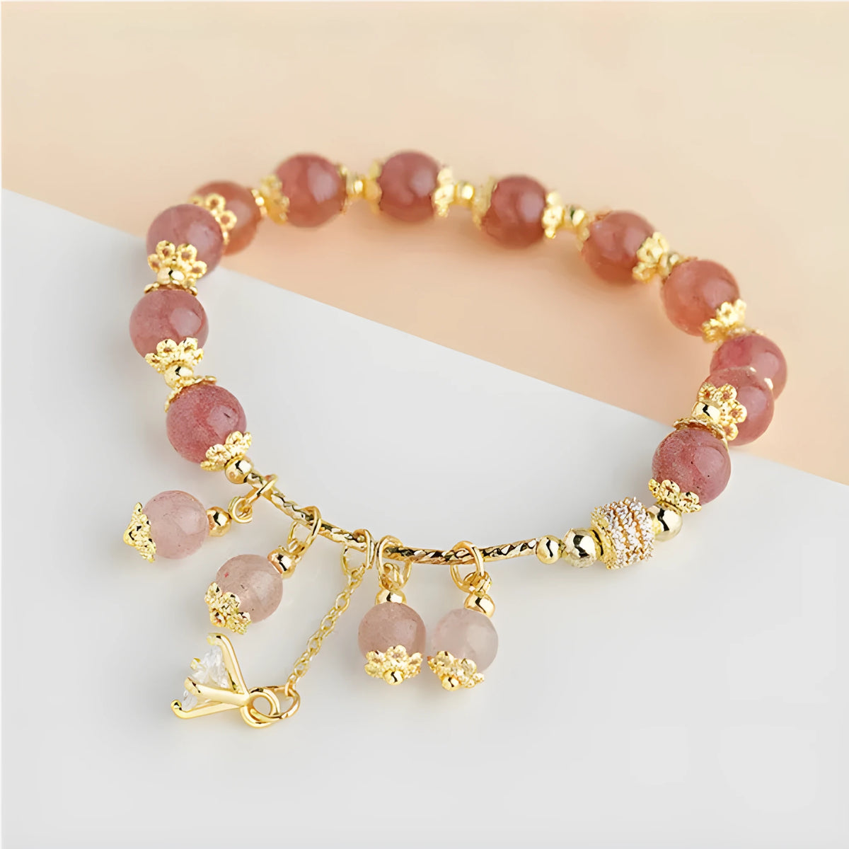 Pink strawberry quartz crystal bracelet with heart shapes and pearl accents for women