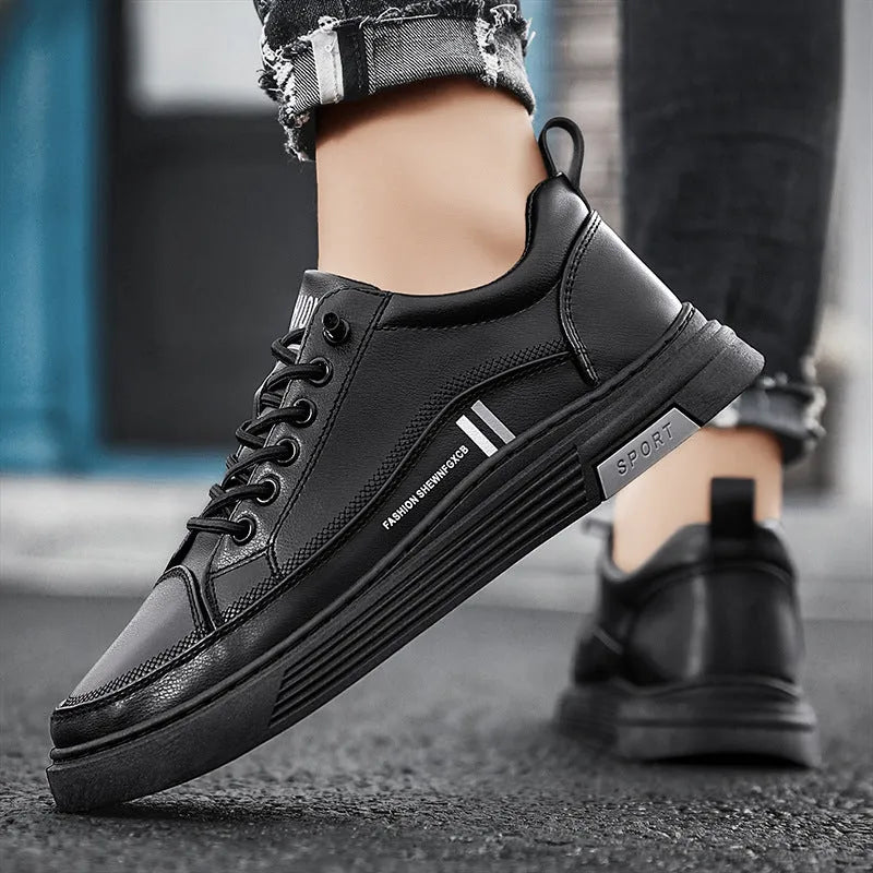 Men's black and white low-top skate shoes with elastic band and rubber sole