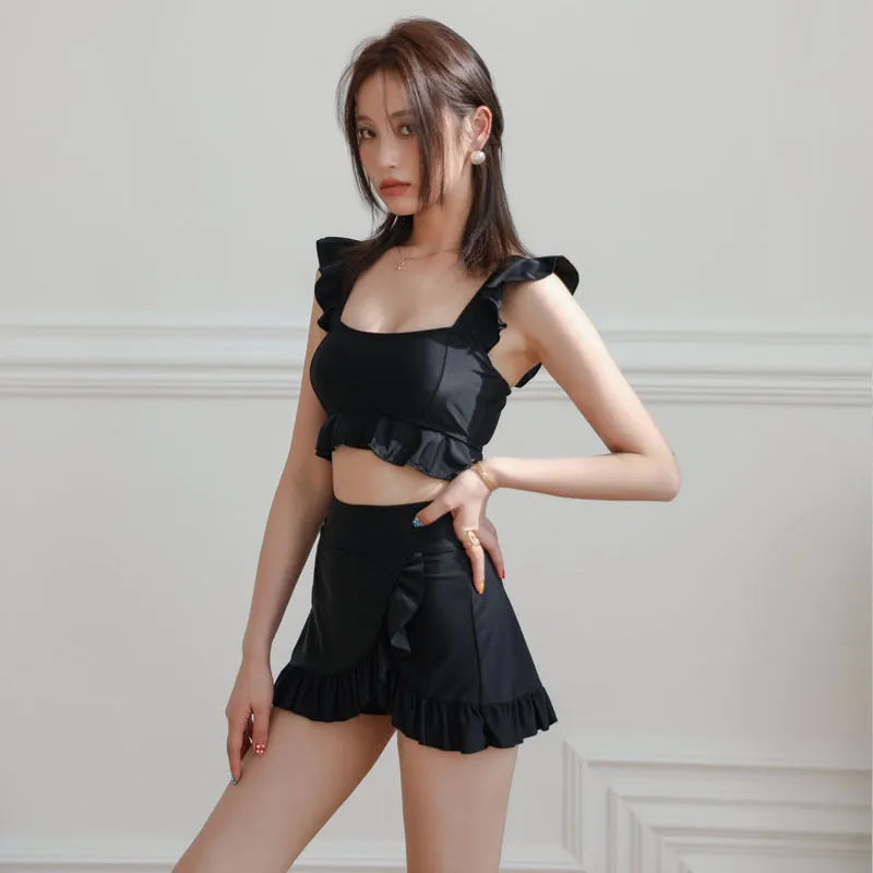 Black nylon women's split swimsuit two-piece bikini set in sizes M, L, and XL