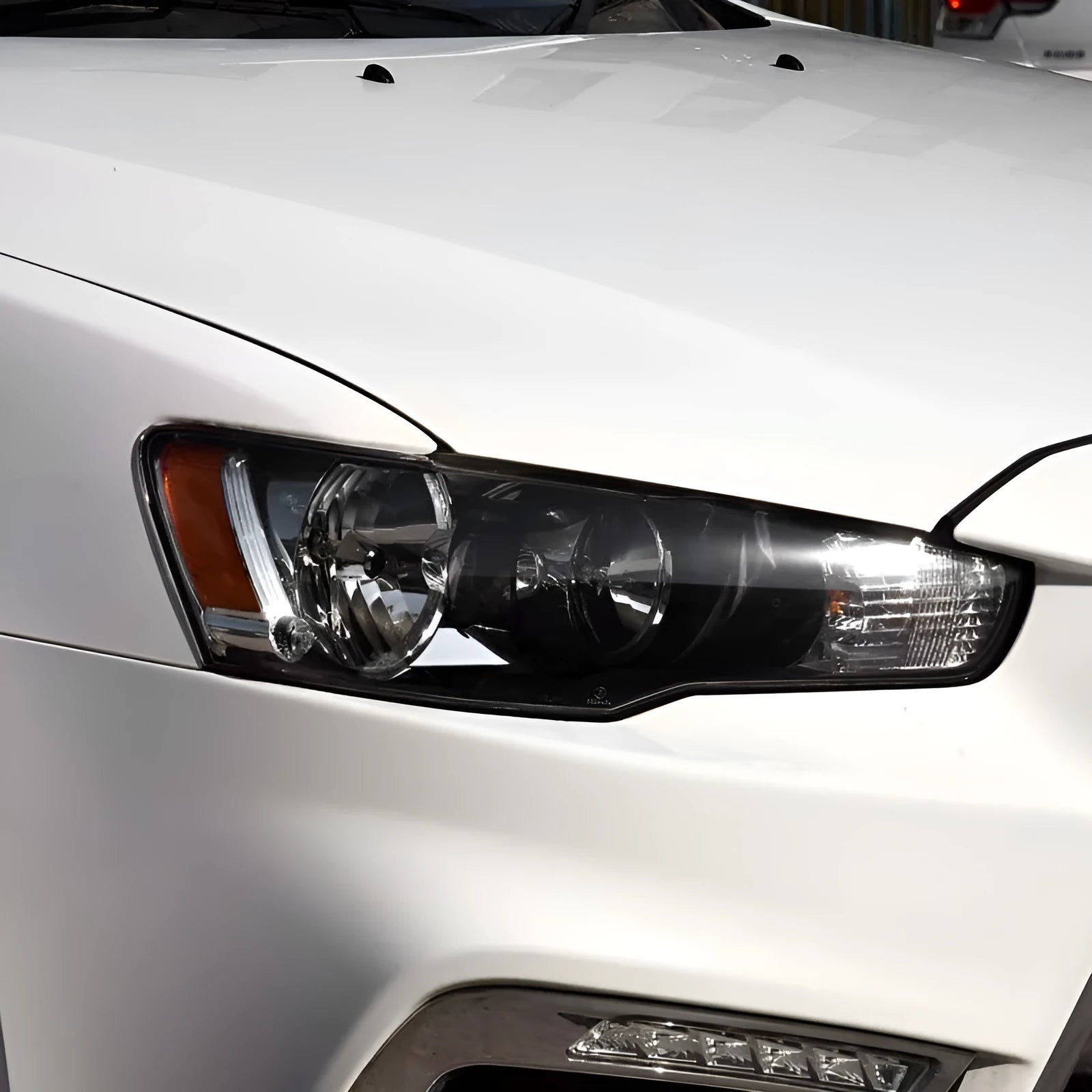 Transparent plastic headlight housing cover showing 50x30x20mm dimensions