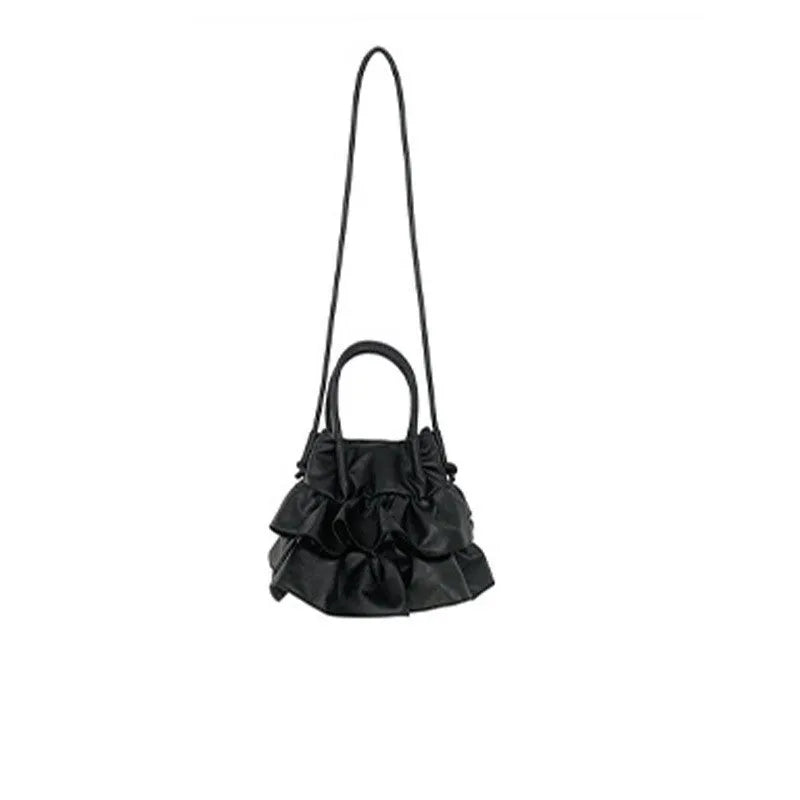 Ruffled bucket-style shoulder bag in Beige with open outer pocket and folding design