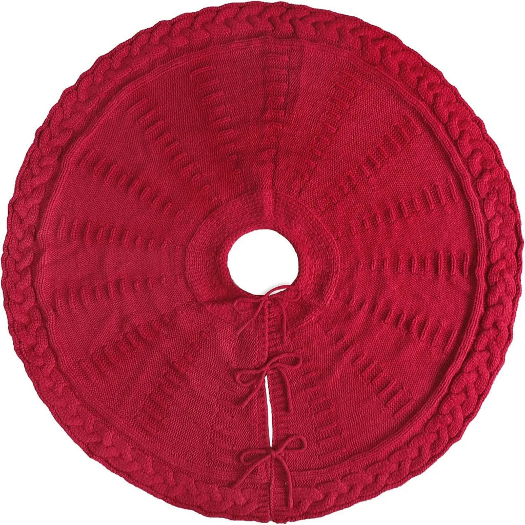 Round wool knitted Christmas tree skirt, 122cm diameter, in red or milky white, shown around a tree base