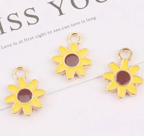 Cute flower keychain accessory in alloy with dripping oil finish, available in P777-1 P777-2 P777-3 colours