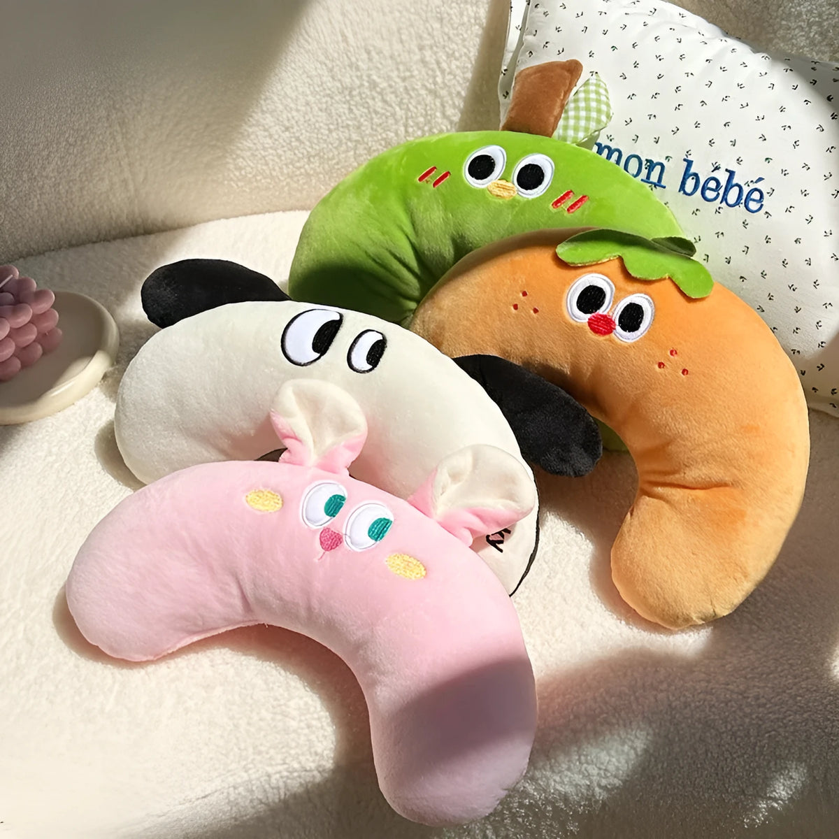 Plush U-shape pet pillow, 23cm by 30cm, in green apple, black ear white puppy, pink rabbit, or orange