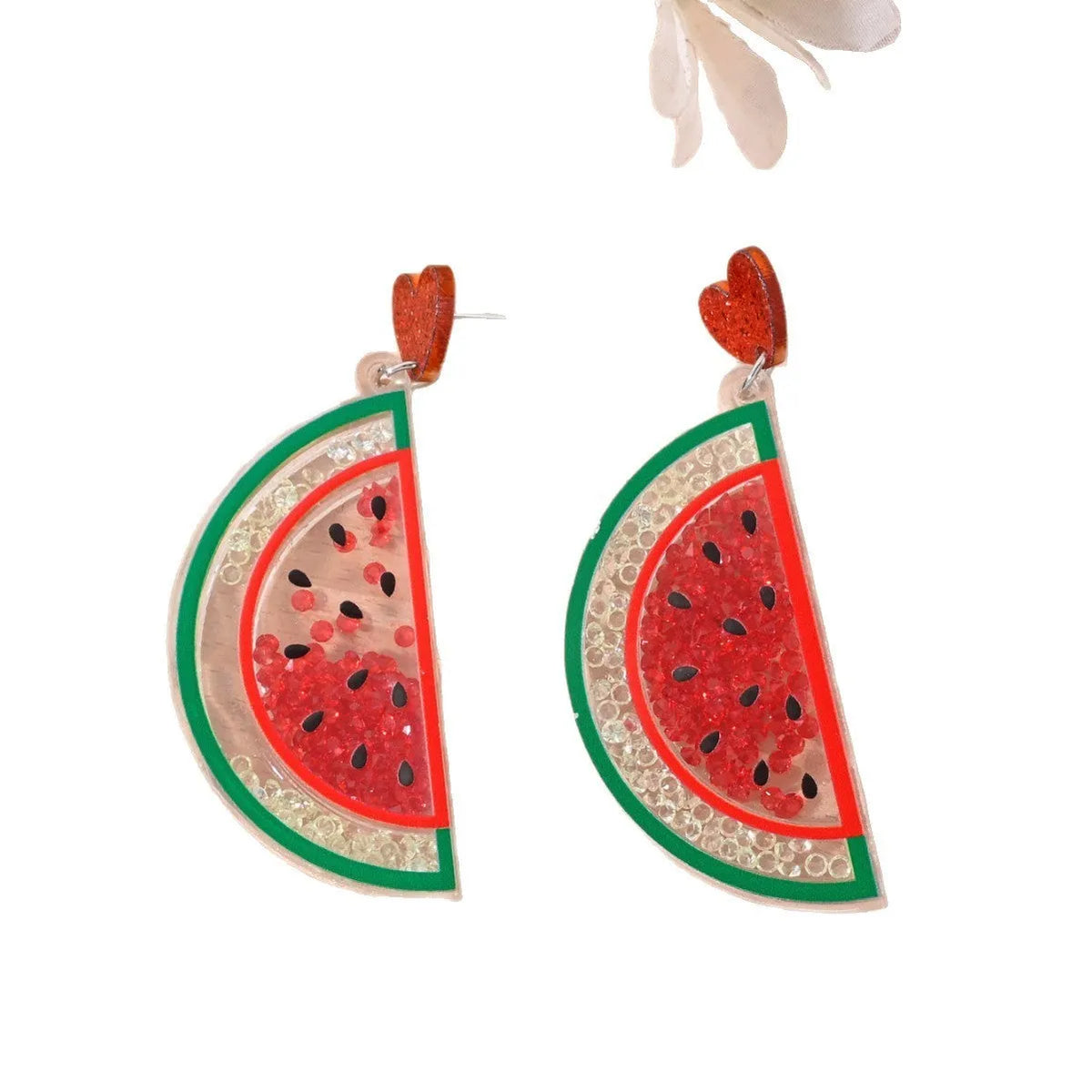 Set of acrylic earrings shaped like cherry, strawberry, watermelon, pineapple, coconut, cake, and ice cream.